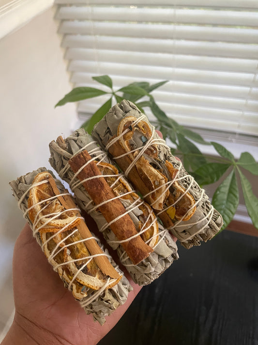 White sage with orange slices and cinnamon